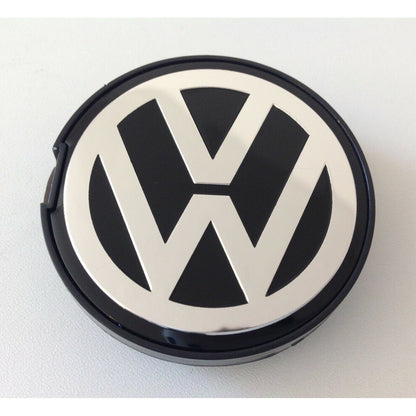 55mm VW centre cap on white background showing front and clip side
